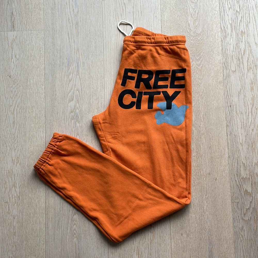 Freecity Orange Track Pants with Black and Blue Logo